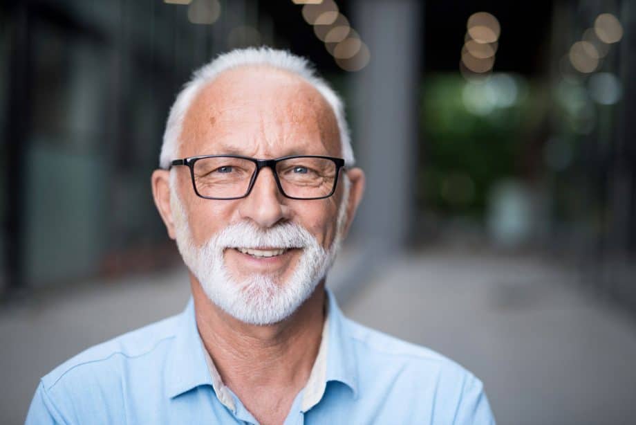 Man smiling with dental implants