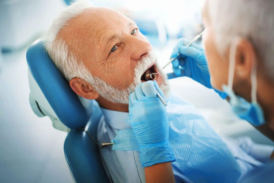 mature man in dental chair